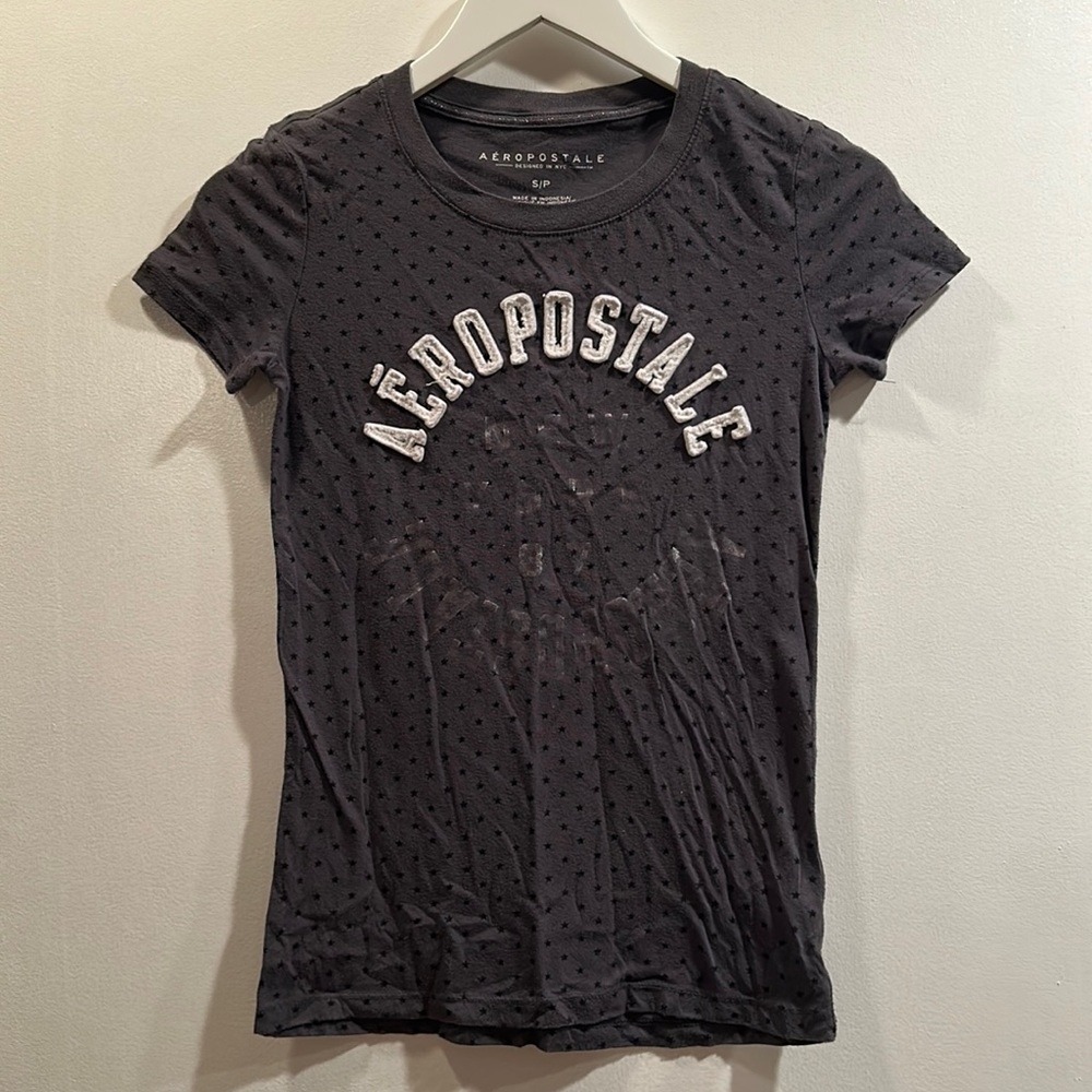 Grey Aeropostale with glossy writing. Size S/P